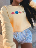 EMBROIDERED SHELLS SWEATSHIRT