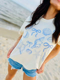 SHELLS & BOWS TEE