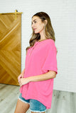 In the Rotation Exposed Seam Tee in Hot Pink