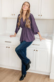 Raven V-Neck Peplum Blouse